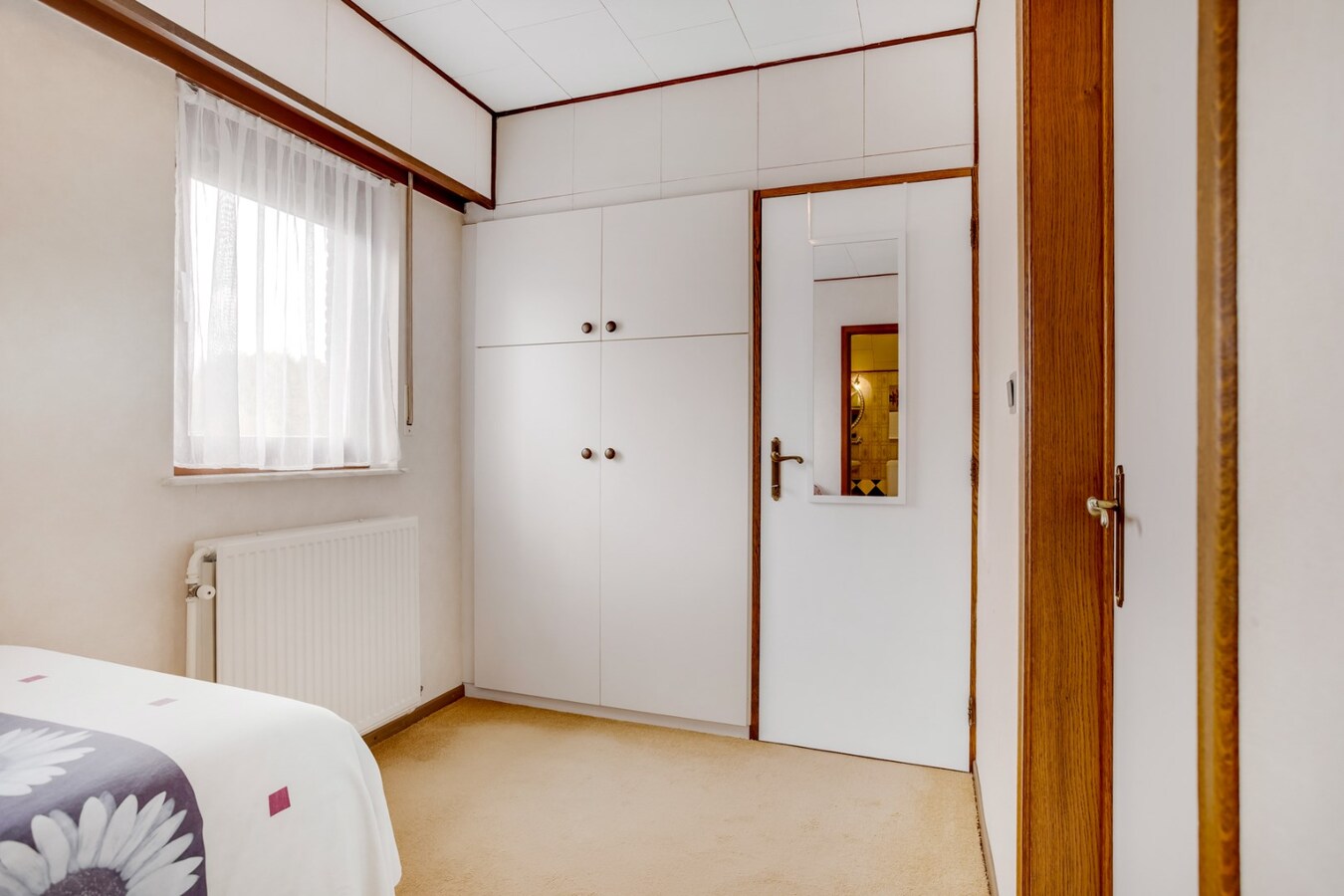 Vrijstaande woning met garage op ruim perceel in het centrum. 