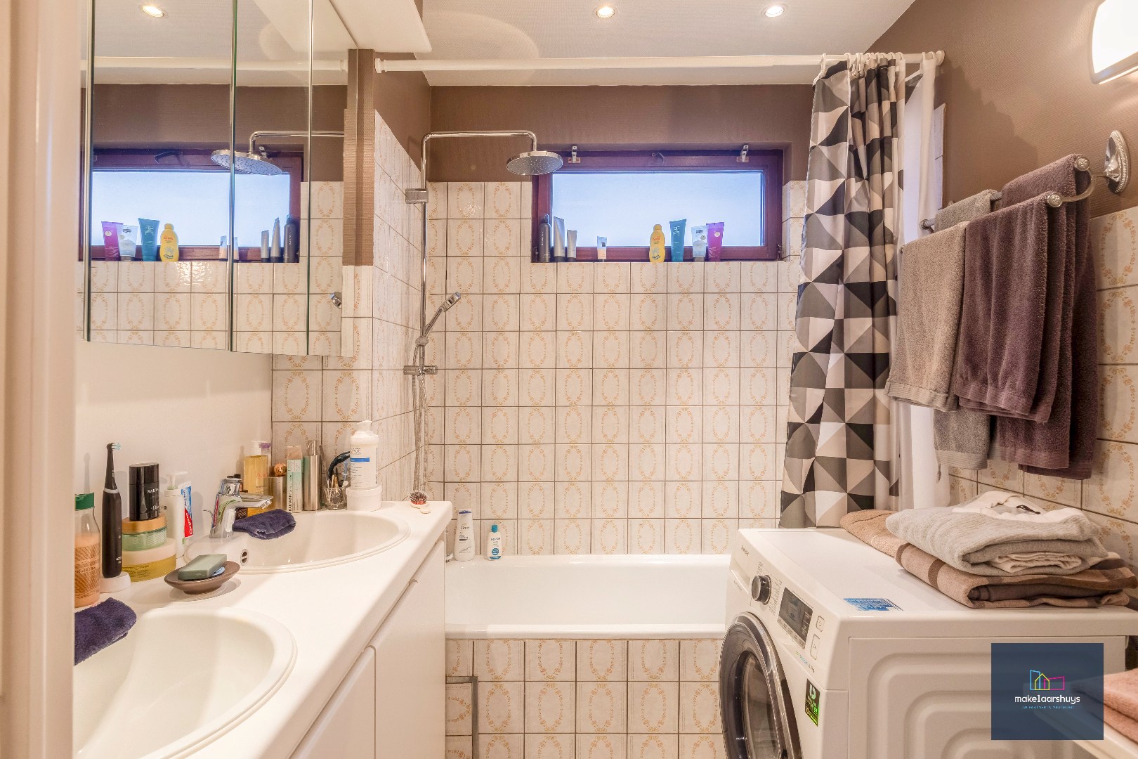 Ruim 2 slaapkamerappartement met garagebox nabij de Blaarmeersen 