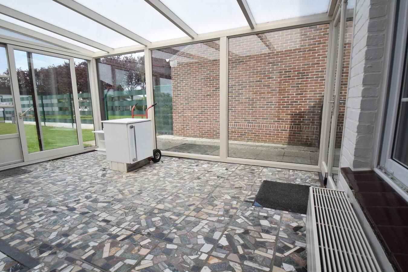 Ruime halfopen 3-slaapkamer-woning met garage en tuin 