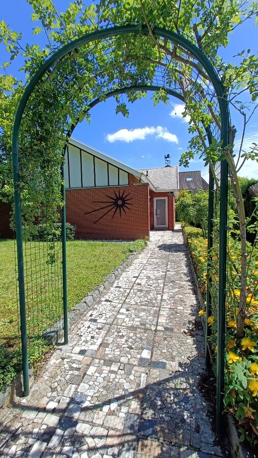 Open bebouwing met tuin te Bierbeek 
