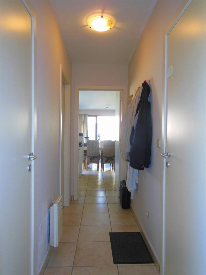 Gezellig gelijkvloersappartement met zonnige tuin en garage 