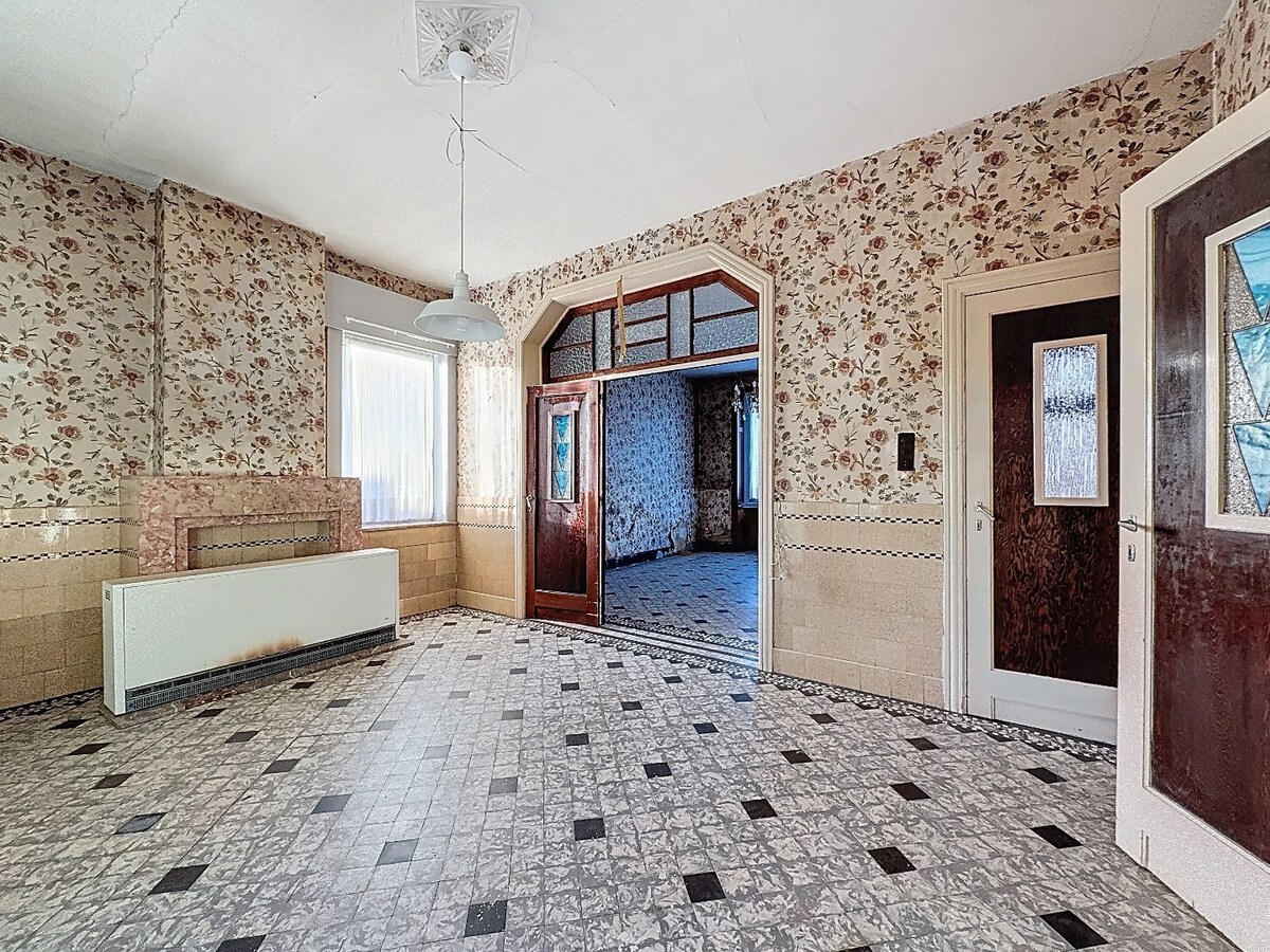 Te renoveren woonhuis met bouwgrond te Balegem/Elene 