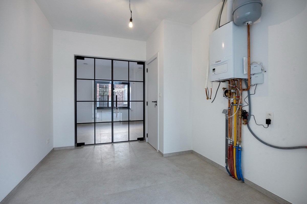 Volledig gerenoveerde woning met 3 slaapkamers, 2 badkamers en tuin in Tienen! – EPC A - bewoonbare opp. 139 m² 