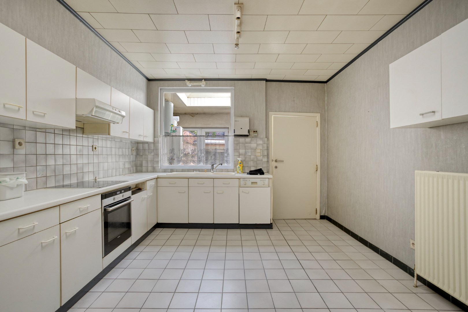 Centraal gelegen rijwoning in Kessel-Lo met parking - EPC 246 kwh/m² 