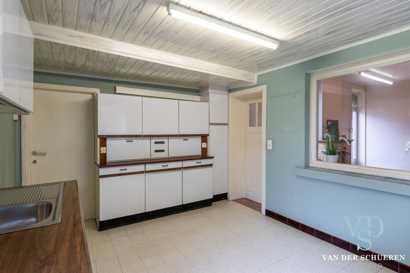 Statige herenwoning met potentieel ! 