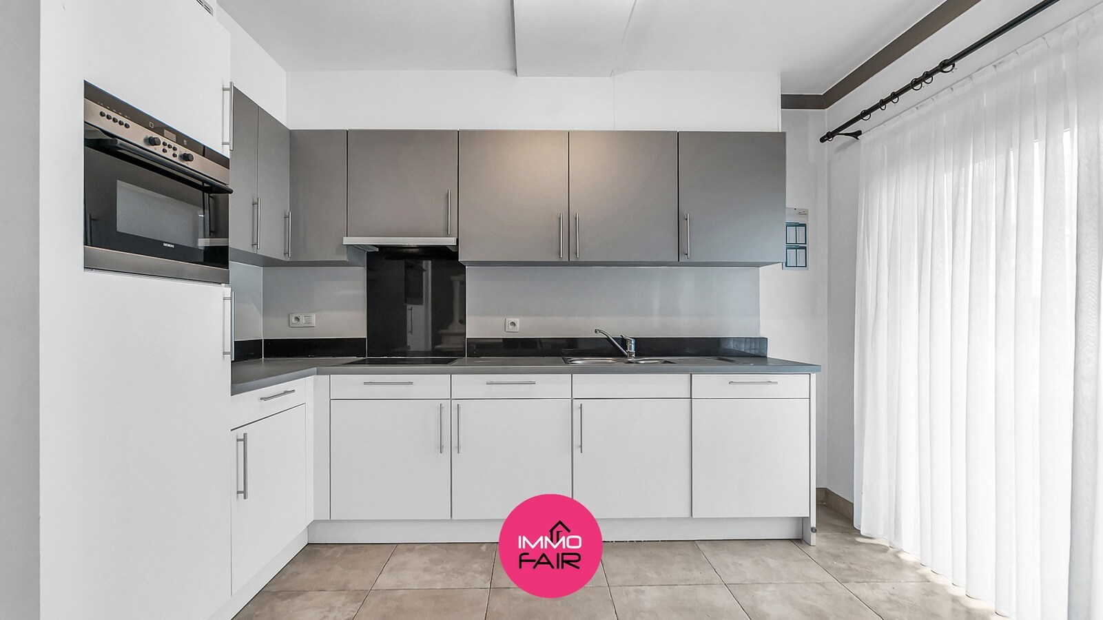 Gelijkvloers appartement met ruim terras in hartje Lanaken 
