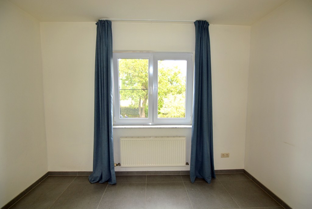 Appartement (104 m²) met 2 slpks, garage en kelderberging. 