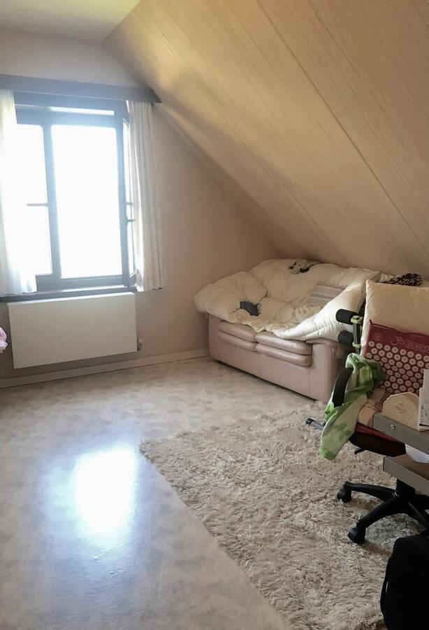 MOOIE HALF OPEN BEBOUWING MET ZUIDGERICHTE TUIN TE WESTENDE DORP 