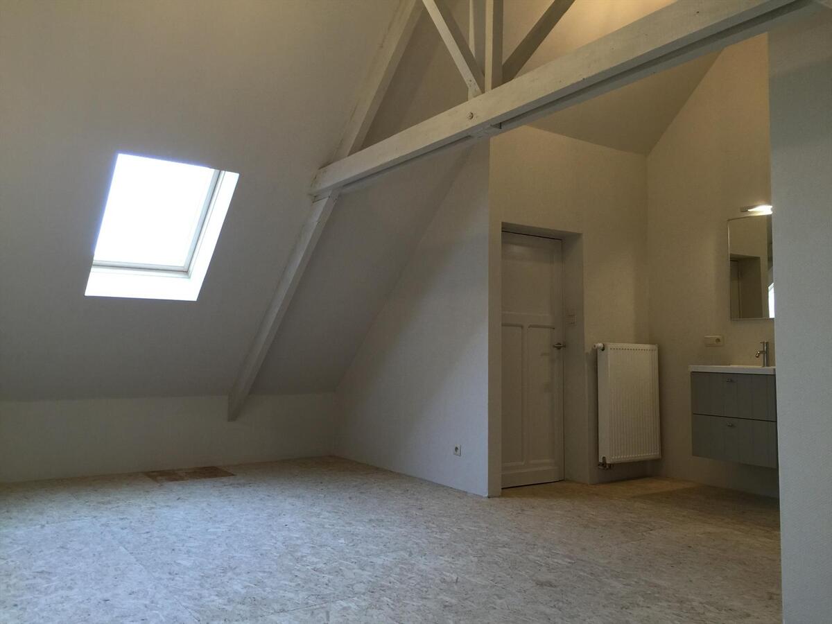 Gezellige, degelijke woning met aangename tuin. 