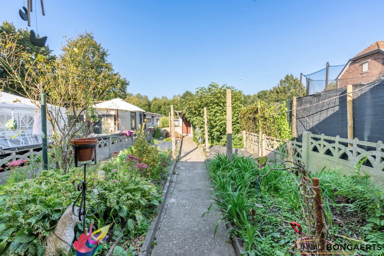 Ruime woning met tuin, garage en 4 slaapkamers. 