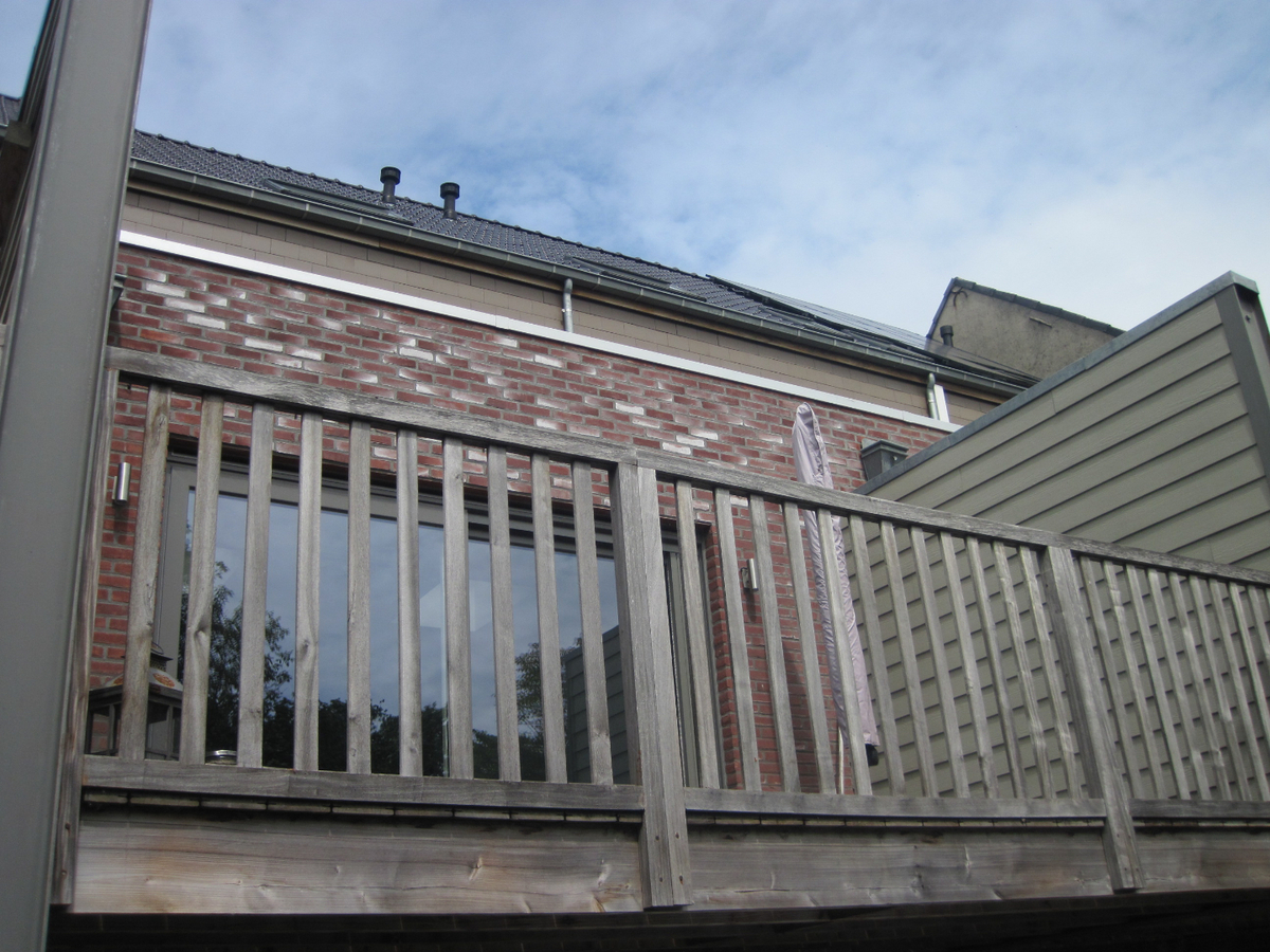 Recent vernieuwde rijwoning nabij de Schelde. 