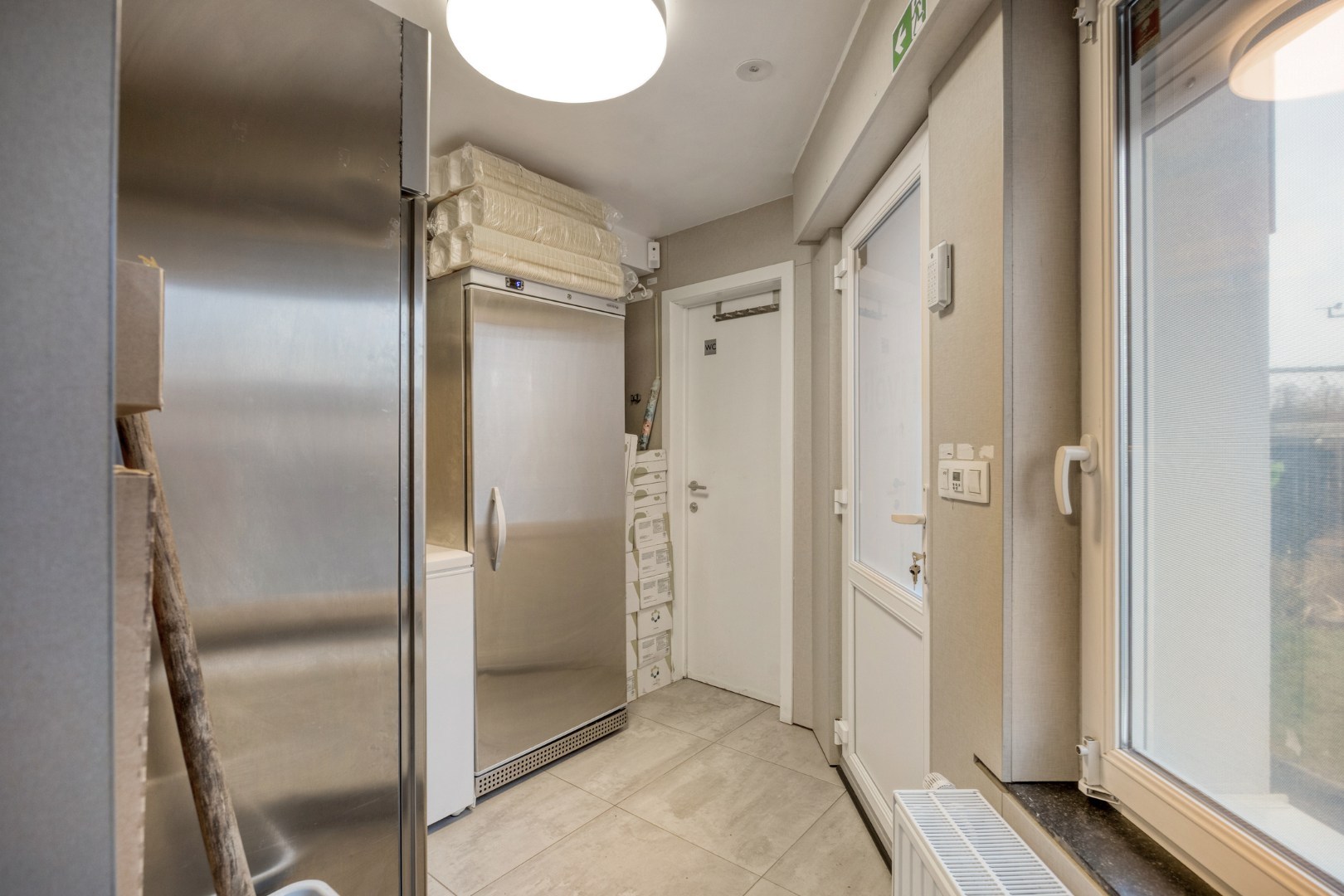 Opbrengsteigendom met handelspand en 3 appartementen te koop in Heverlee op een super ligging! 