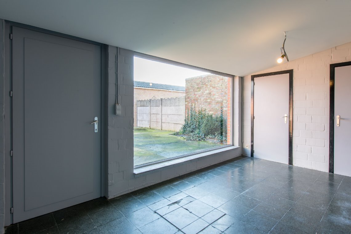 Gezellige rijwoning met grote garage - Centrum Nieuwkapelle 