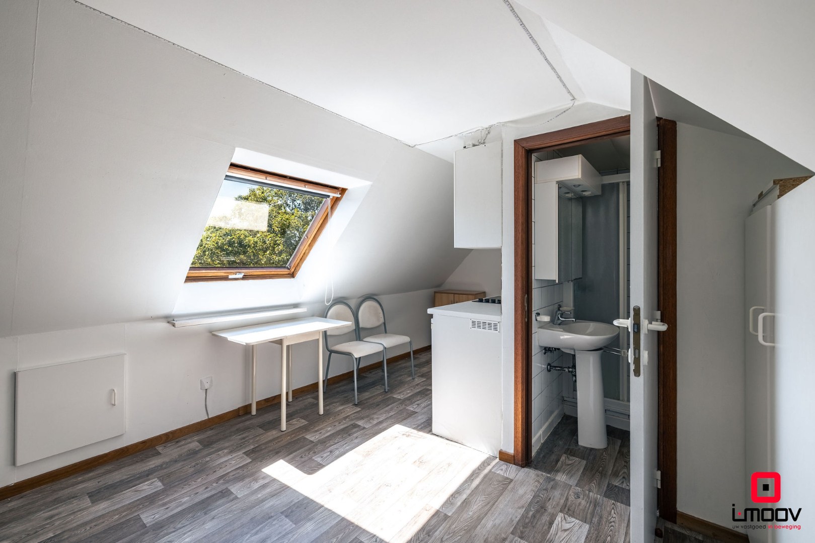 Lichtrijke studio met parkzicht te Sint-Amandsberg 