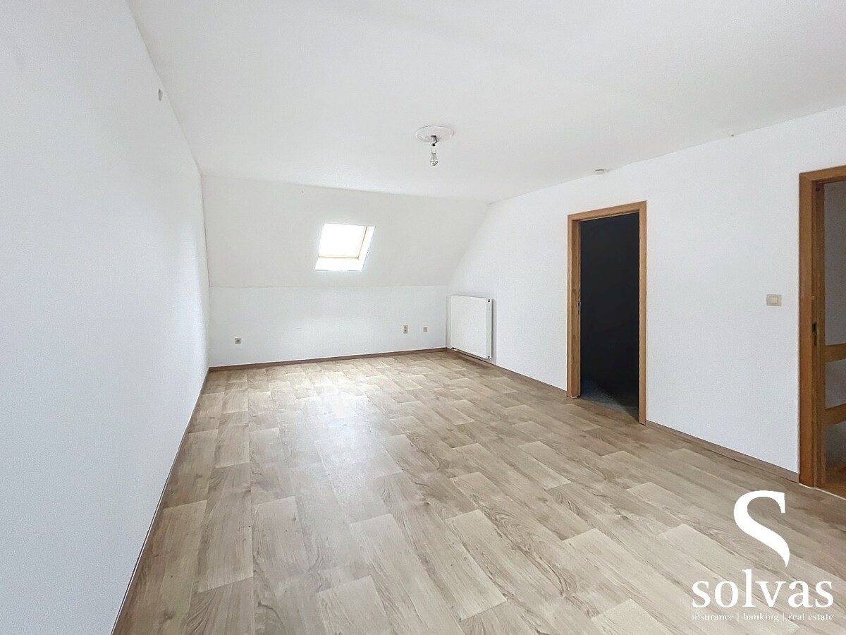 Drieslaapkamer woning in centrum Lotenhulle met tuin en garage 