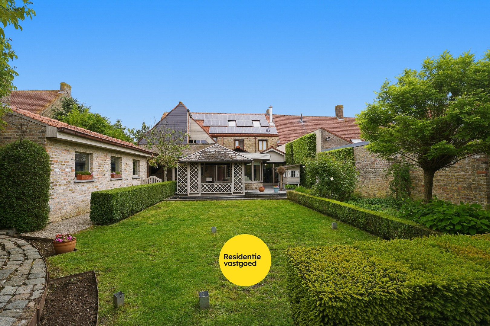 Unieke woning met polyvalente ruimte en zonnige tuin. 