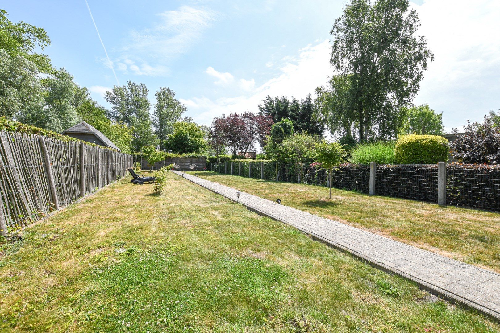 Ruime bel-etagewoning met tuin en bijgebouw, vlakbij centrum De Haan 