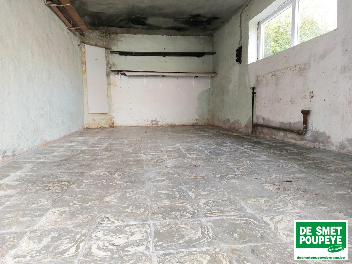 Gelijkvloersappartement met terras en garage 