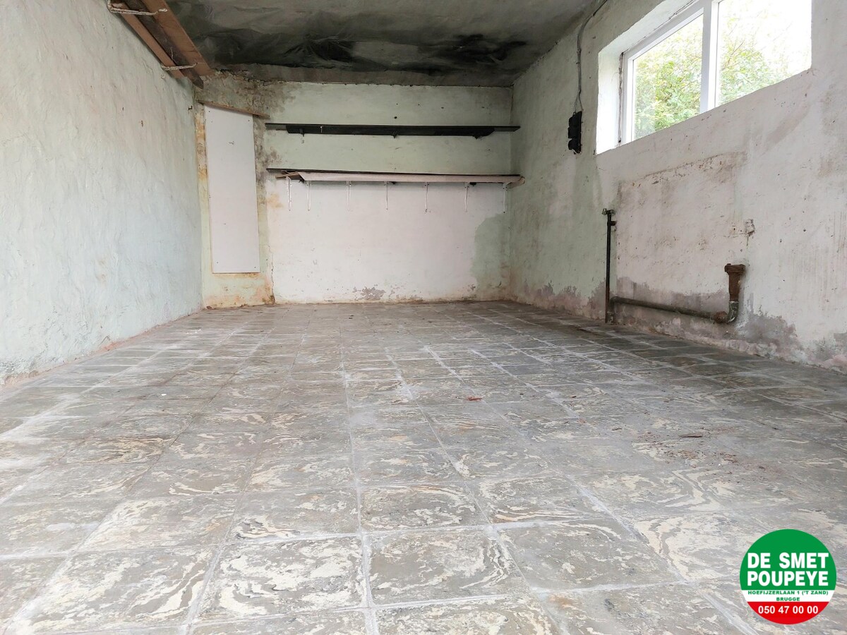 Gelijkvloersappartement met terras en garage 