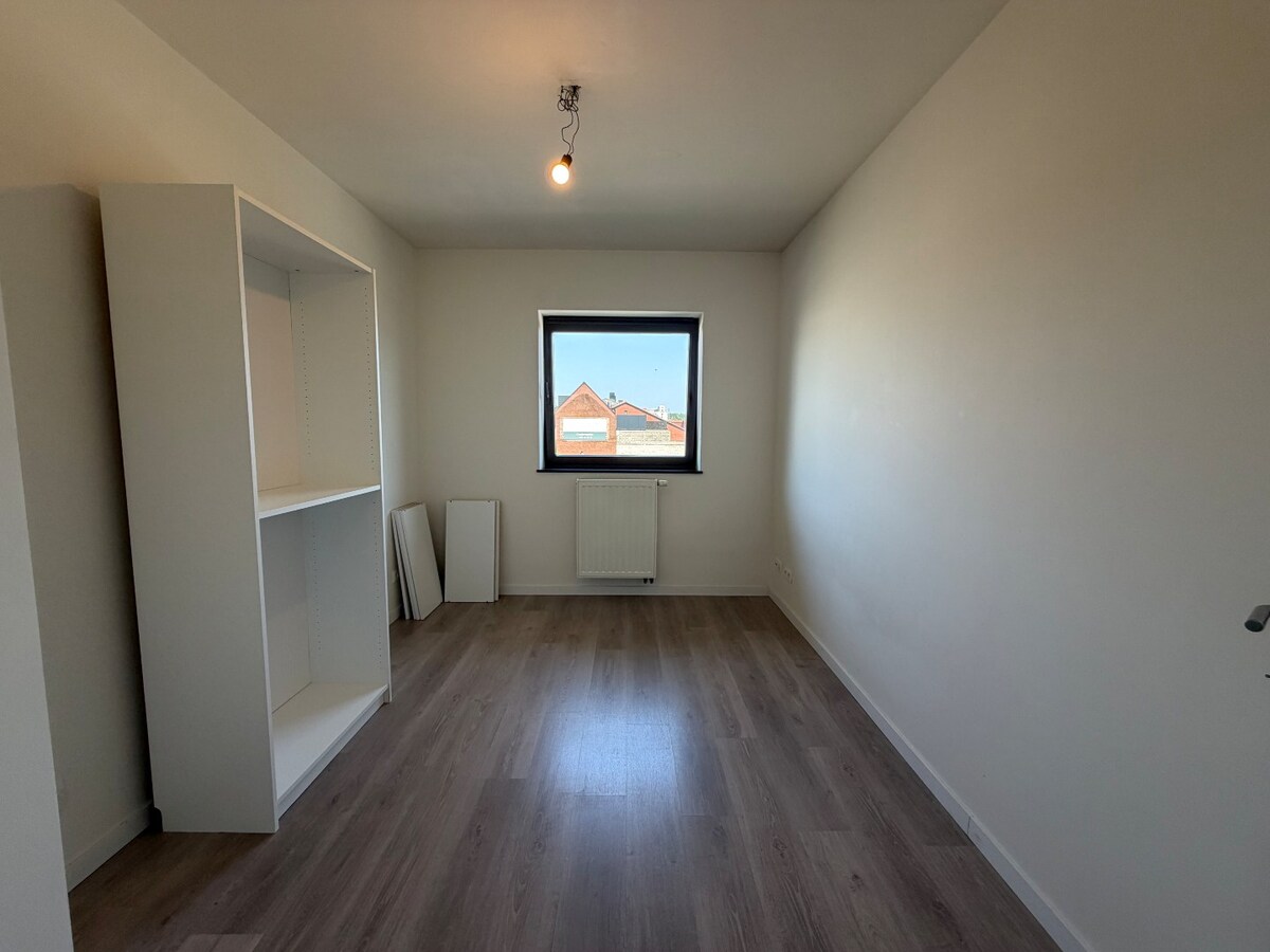 2 slpk-appartement nabij allerhande voorzieningen. 
