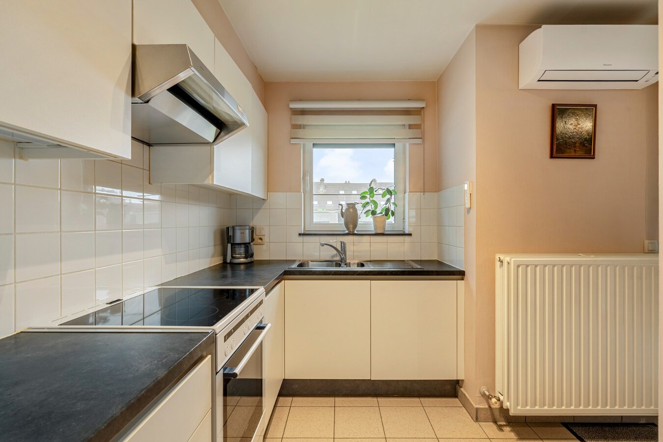 Comfortabel appartement met 1 slaapkamer, terras en autostandplaats nabij het centrum van Maaseik! 