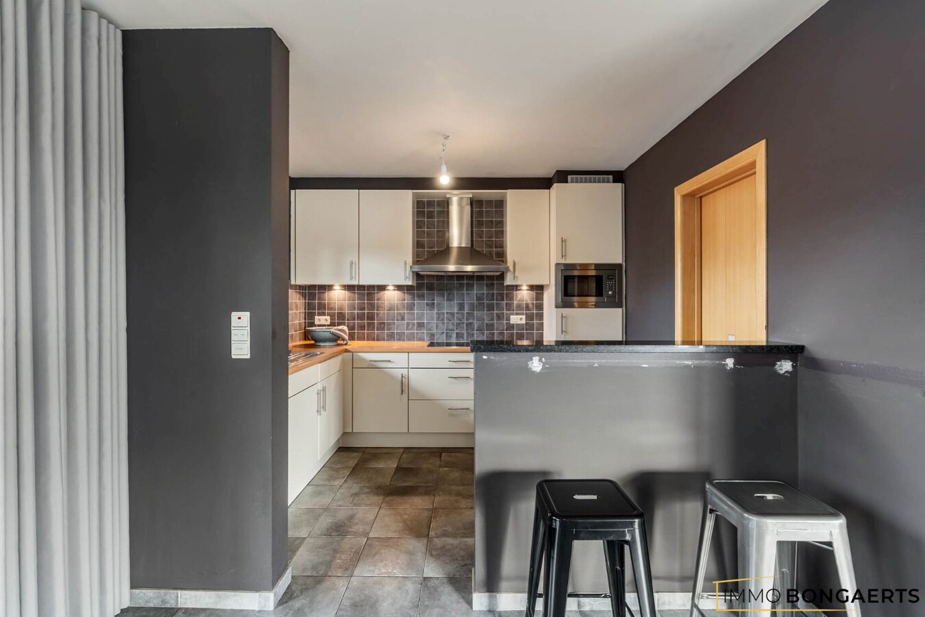 Ruim duplexappartement met 4 slaapkamers 