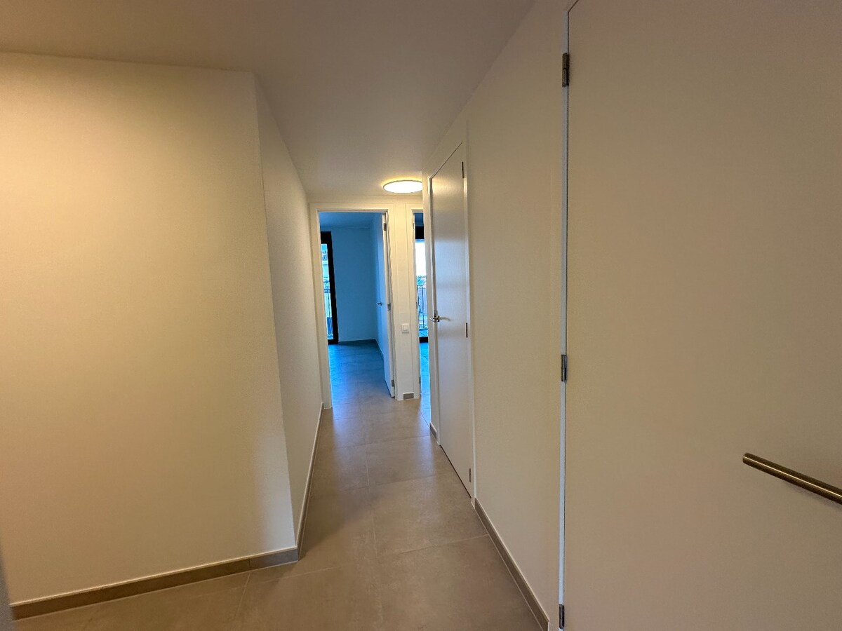 Prachtig nieuwbouwappartement op de vierde verdieping, pal in het centrum van Roeselare 