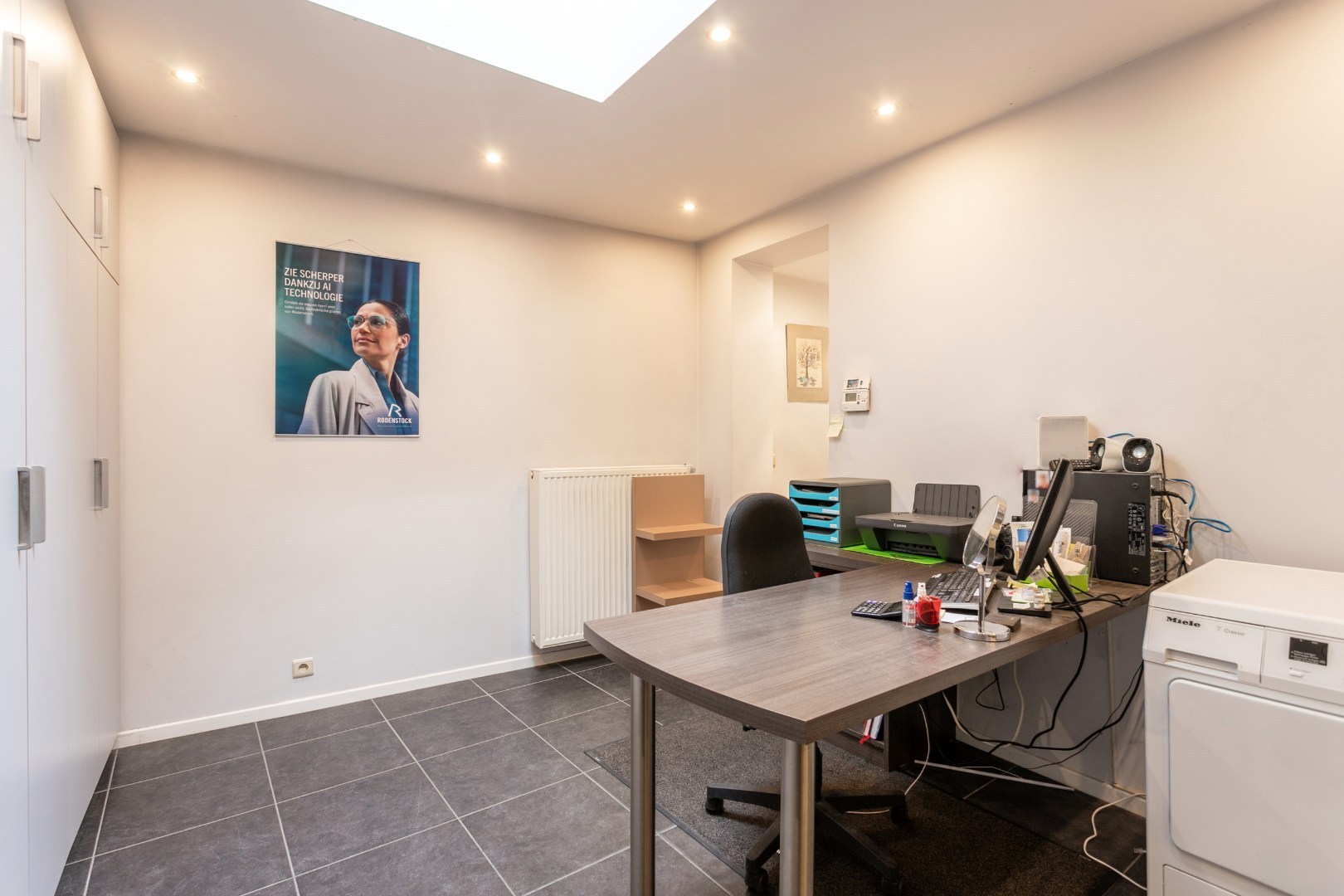 Handelspand met woonst te Halle centrum 