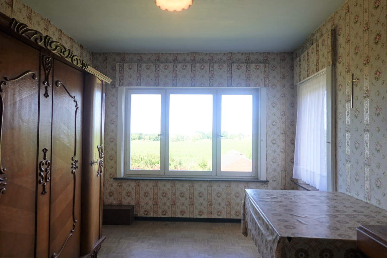 Alleenstaande woning met garage en mooie tuin 