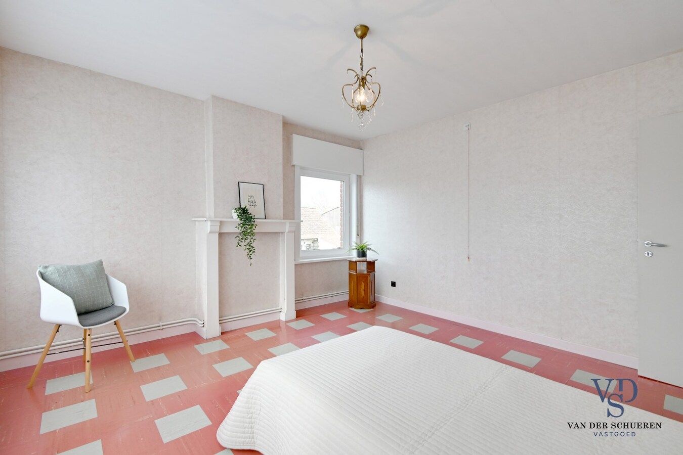 Half Open gezinswoning met potentieel 