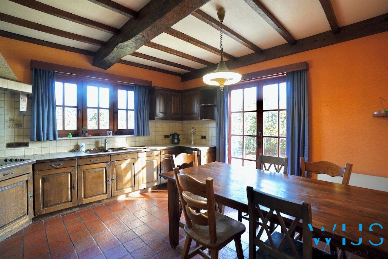 Fantastische open bebouwing met dubbele garage in gegeerde woonwijk te Evergem 