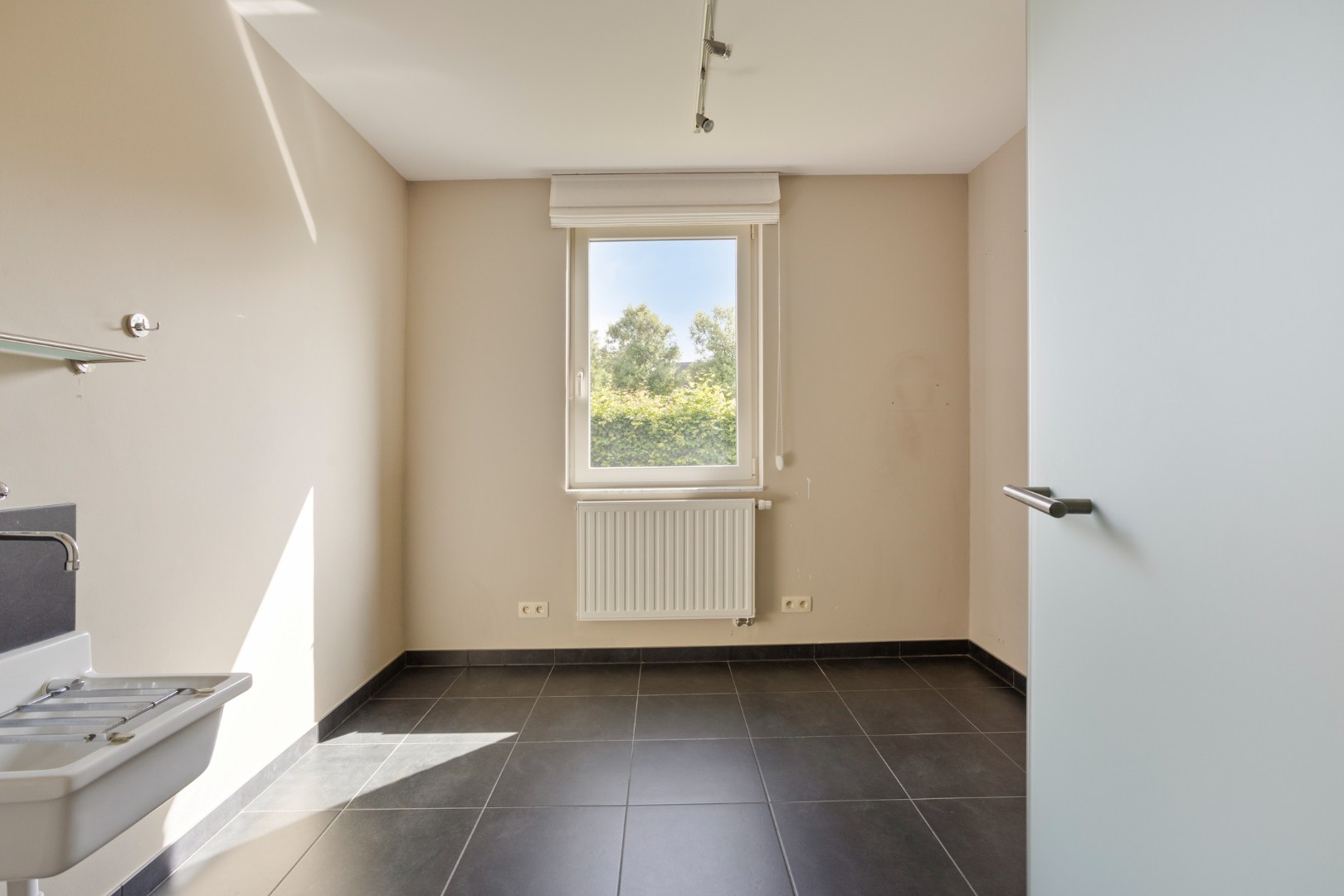 Instapklaar gelijkvloers appartement met groot terras, tuin en garagebox in Kumtich - EPC 104 KWH/m² 
