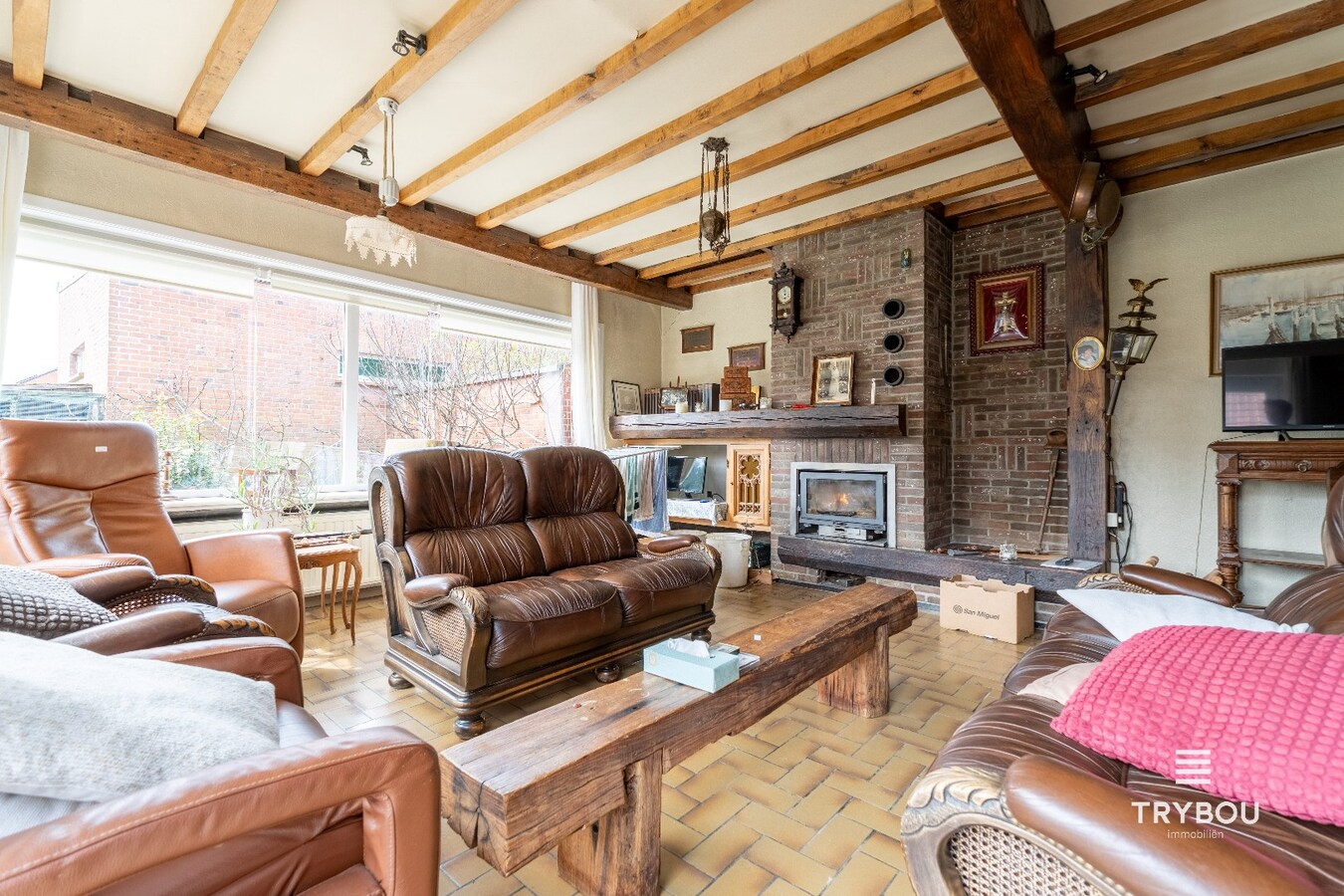 Ruime woning met winkelruimte, loods (optioneel) en garage 