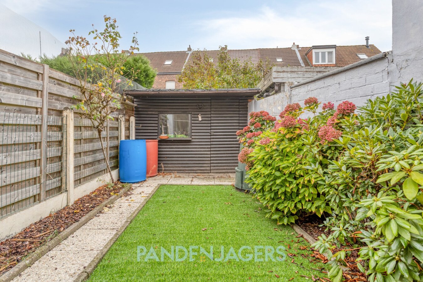 Te renoveren woning met zonnige tuin in hartje Duffel-Oost 