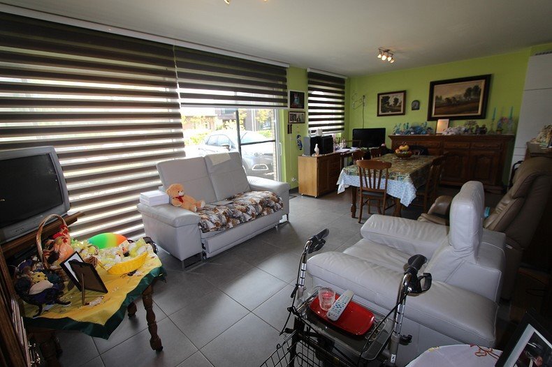 Gelijkvloers appartement met 2 slaapkamers en garage 