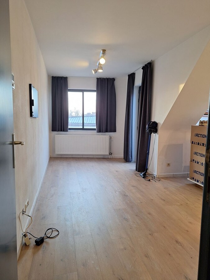 Instapklaar appartement met terras en autostandplaats in hartje Beringen 