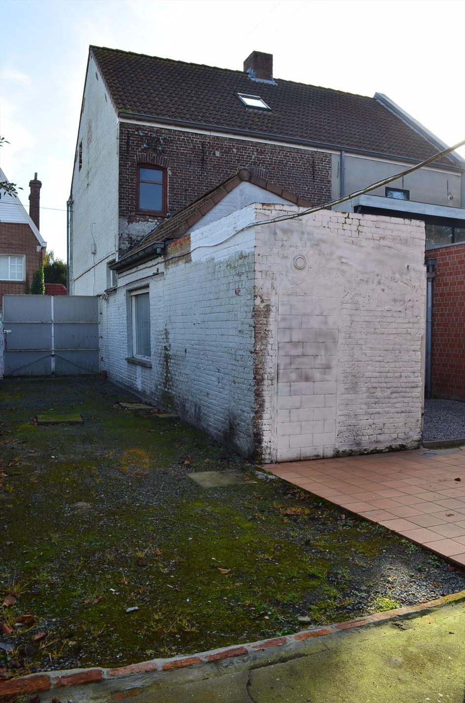 Woning (5 slpks) met handelsruimte en bijgebouw  te Sint-Laureins 