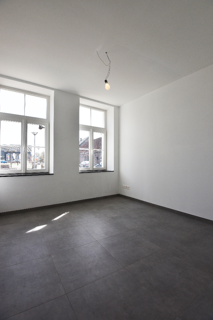 Nieuwbouw appartement met 1 slaapkamer, terras en tuin te Lembeke-Dorp 