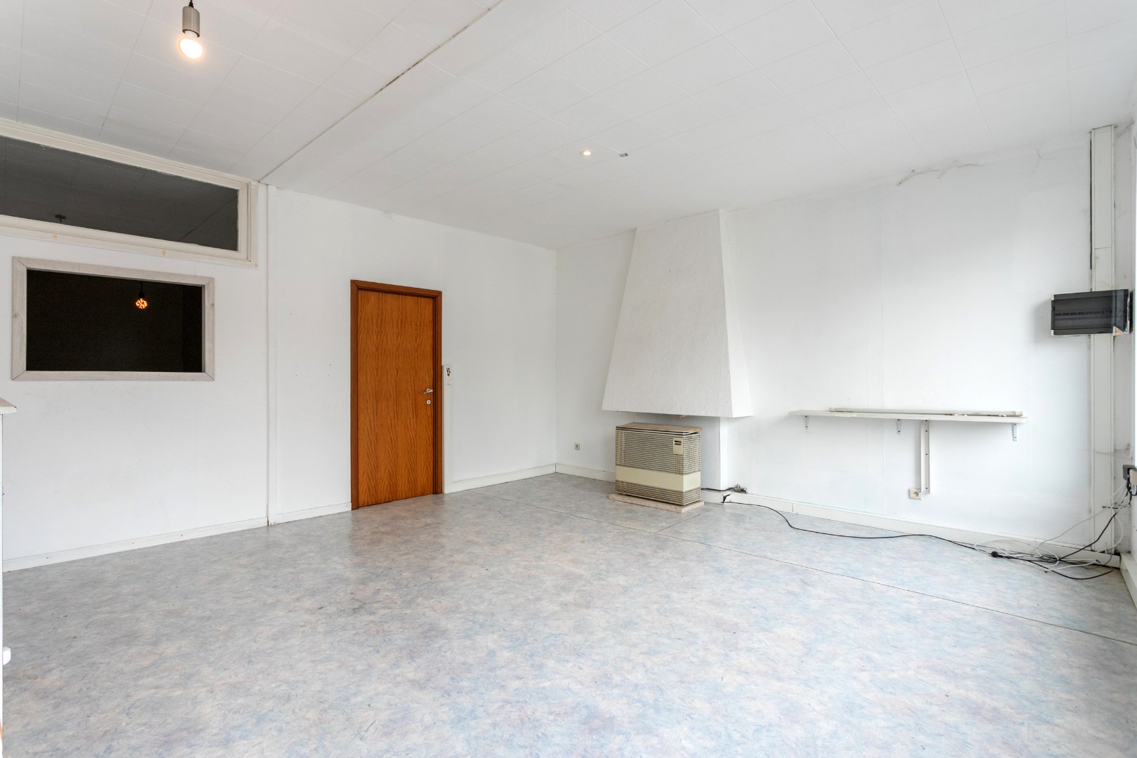 Handelsruimte met woonst op een gunstige ligging 