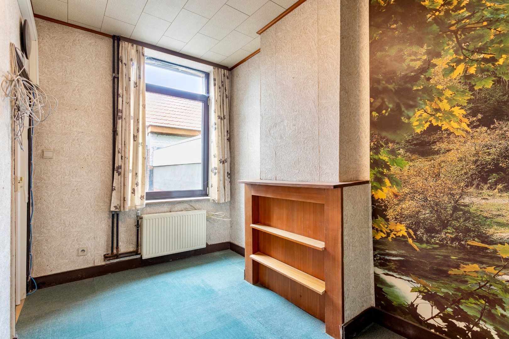 Handelspand met woonst te Halle-centrum 