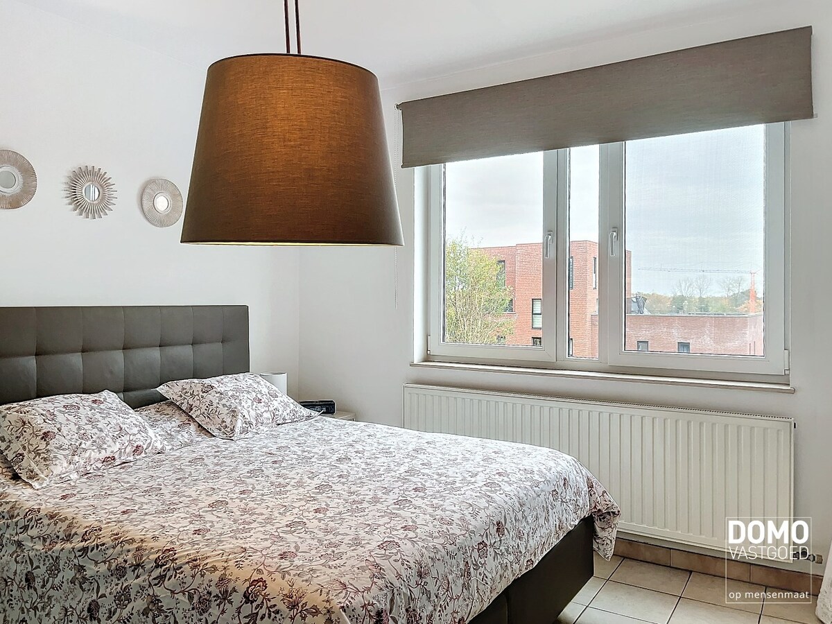 Energiezuinig appartement met 2 slaapkamers en ondergrondse autostandplaats te Hasselt 