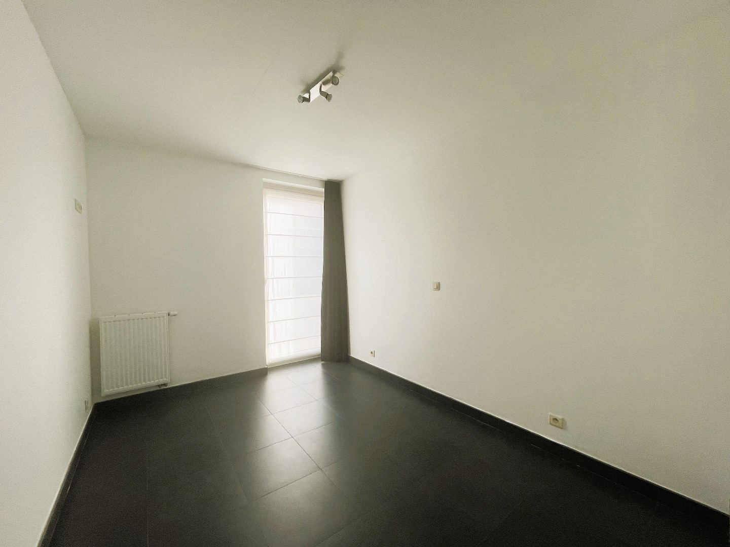 Gelijkvloers appartement met 2 slaapkamers en aangename tuin 