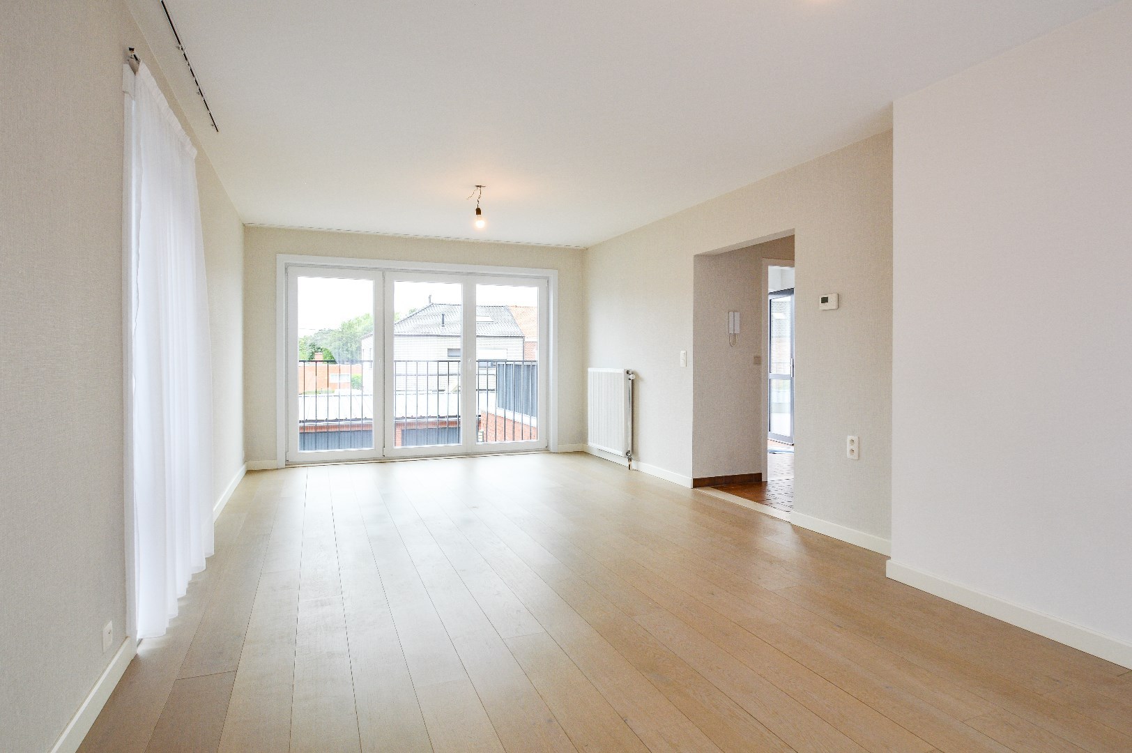 Duplex appartement met 2 slpks en 2 garages in centrum Eernegem 