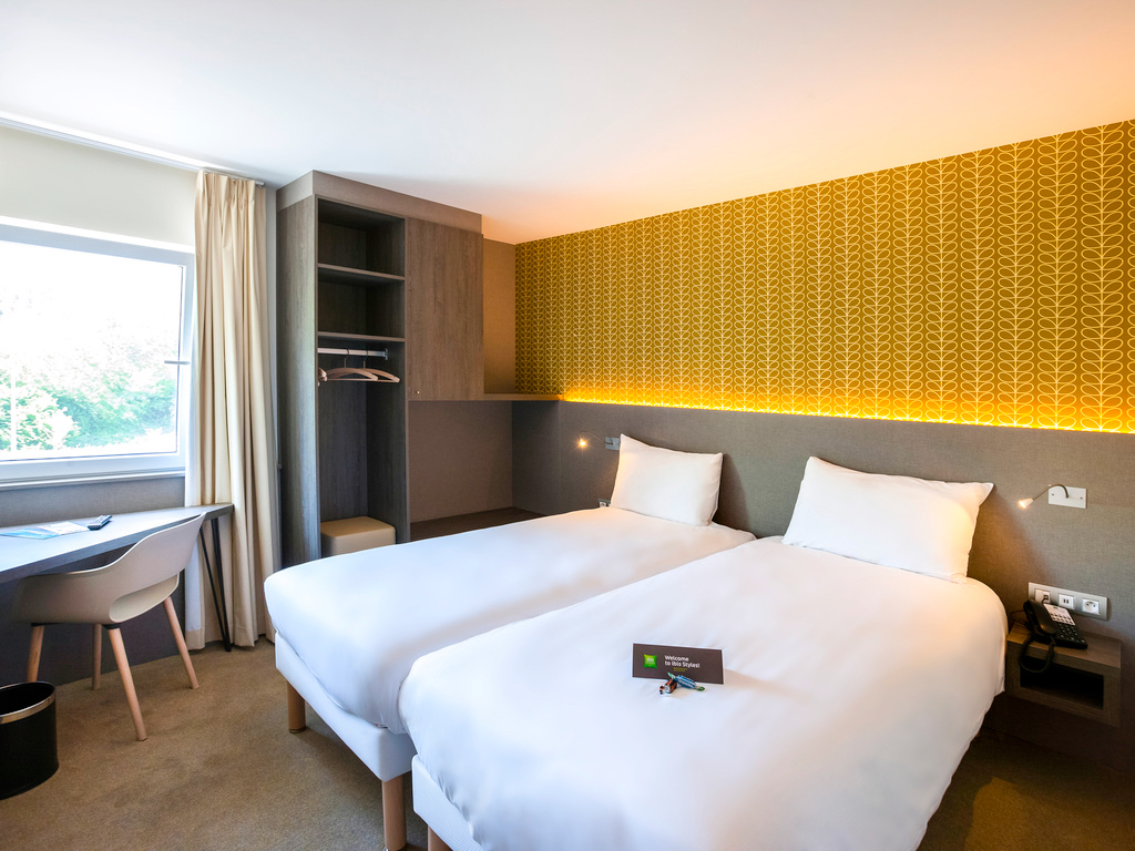 Investeer in een ruime hotelkamer in het ibis Styles Kortrijk hotel! 