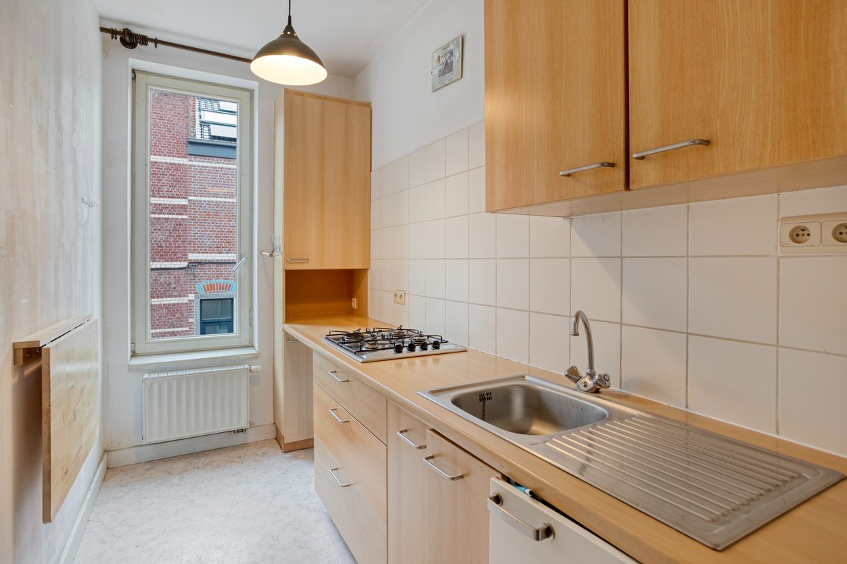 Uniek opbrengstpand met 1 appartement en 2 studentenkamers in centrum Leuven!  – EPC label B - bewoonbare opp. 227 m² 
