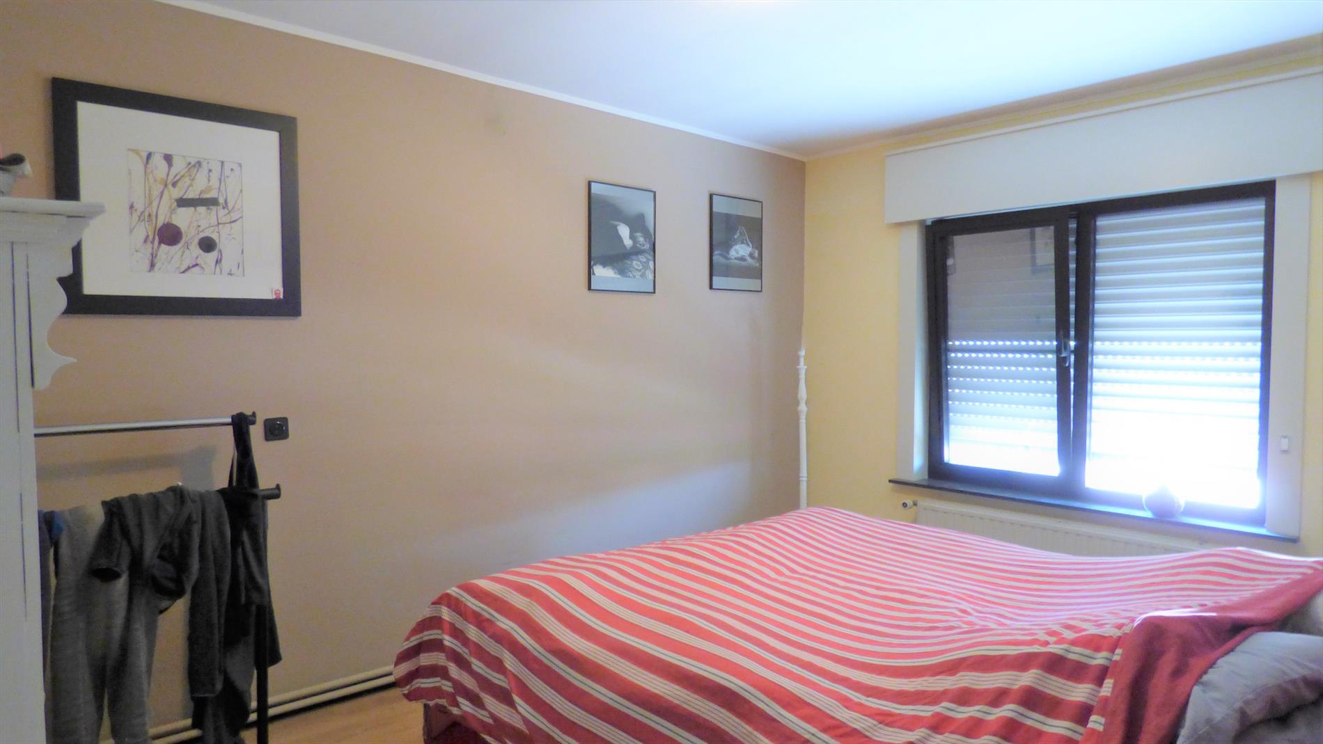 Aantrekkelijke en karaktervolle gezinswoning in het centrum van Zwevegem. 