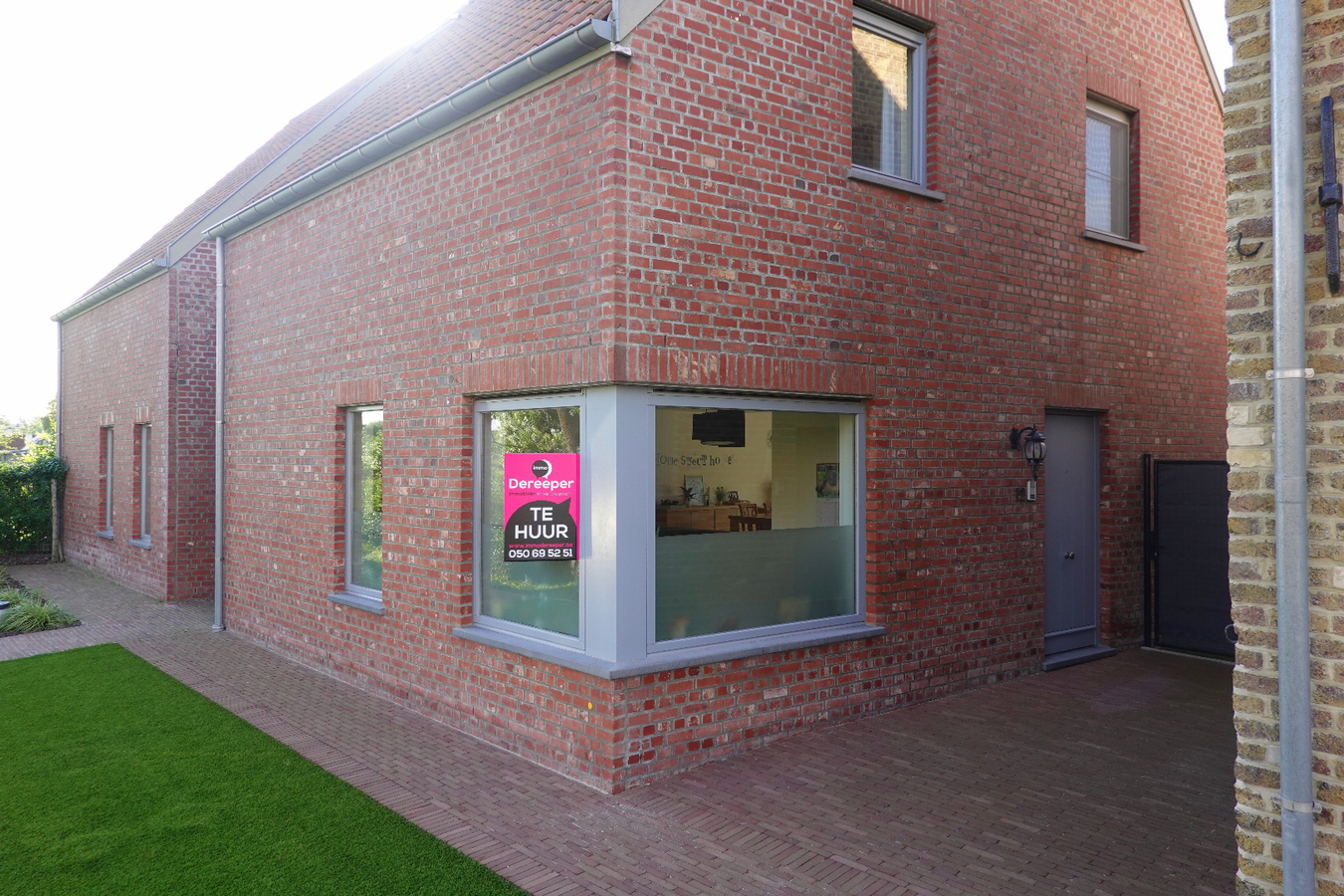 Halfopen woning met garagebox 