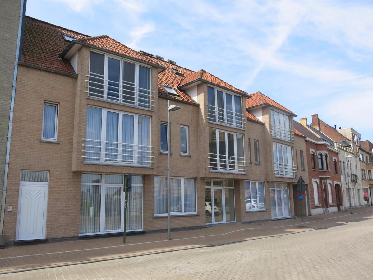 Ruim duplex-appartement met garage 