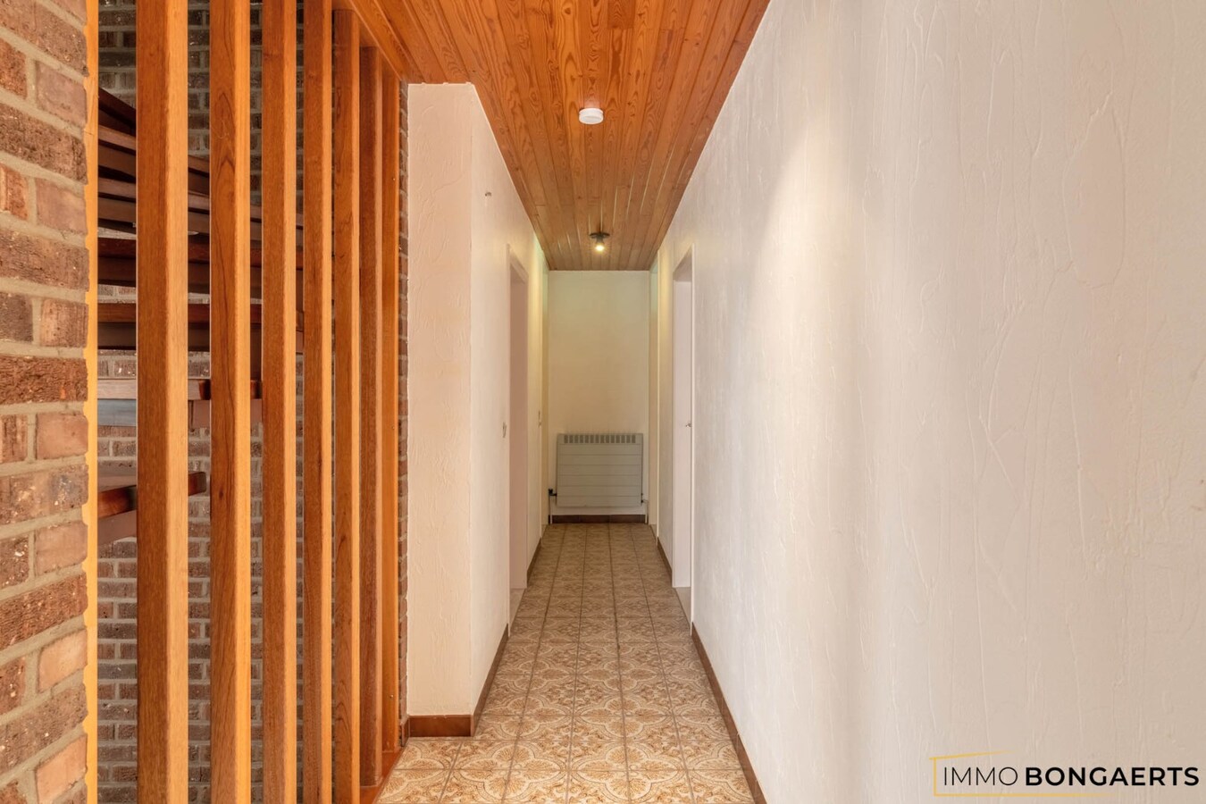 Ruime woning met 4 slaapkamers, tuin en garage in Opglabbeek. 