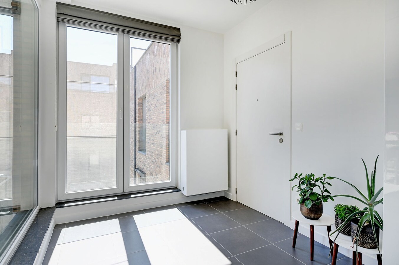 Centraal gelegen appartement met mooi terras en ondergrondse staanplaats 